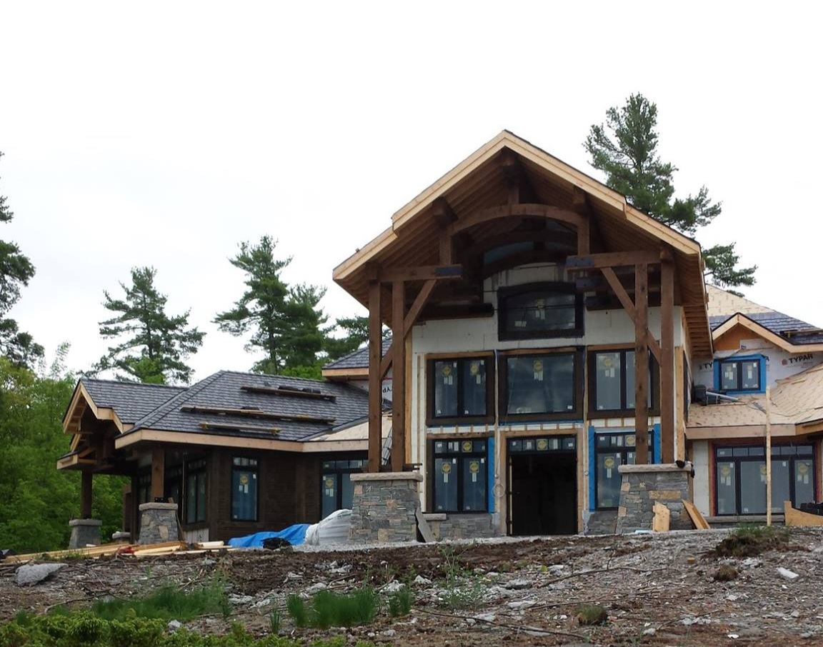 Timber-frame luxury home with an Enviroshake roof system.